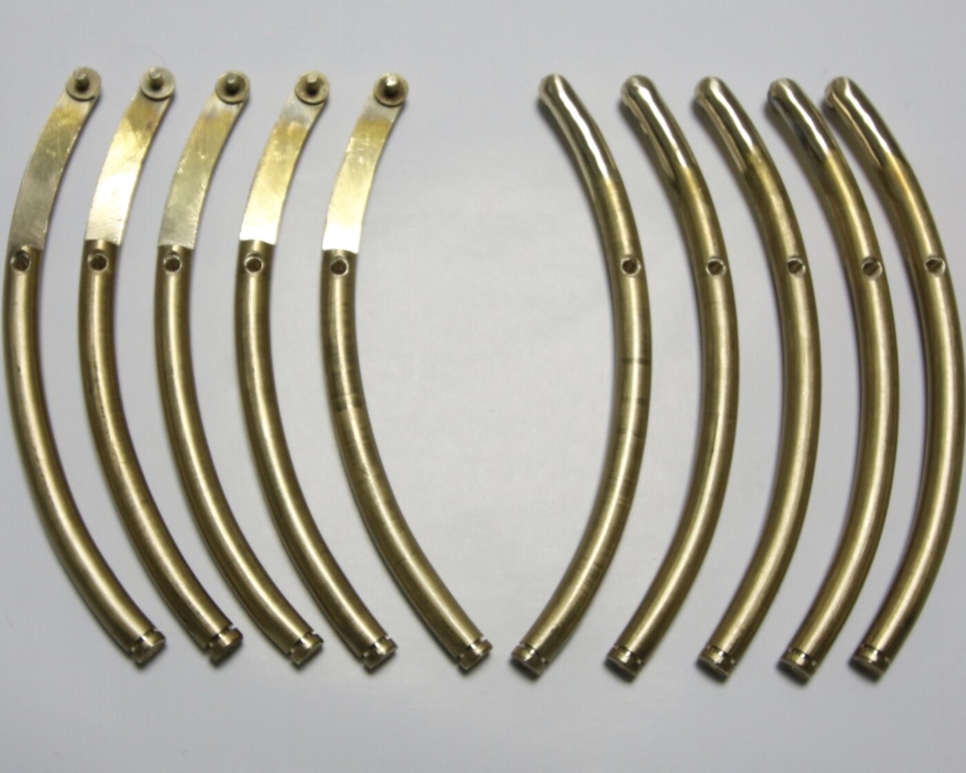 Machined bronze curved segments