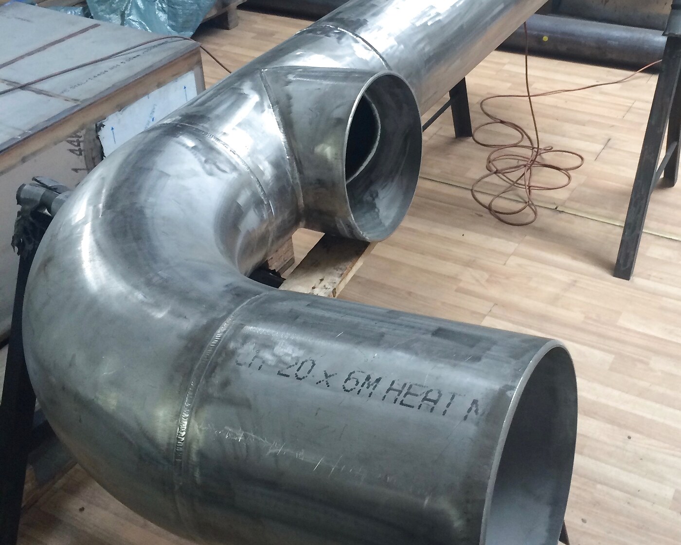 Welded stainless-steel pipe spool with elbow and flared end