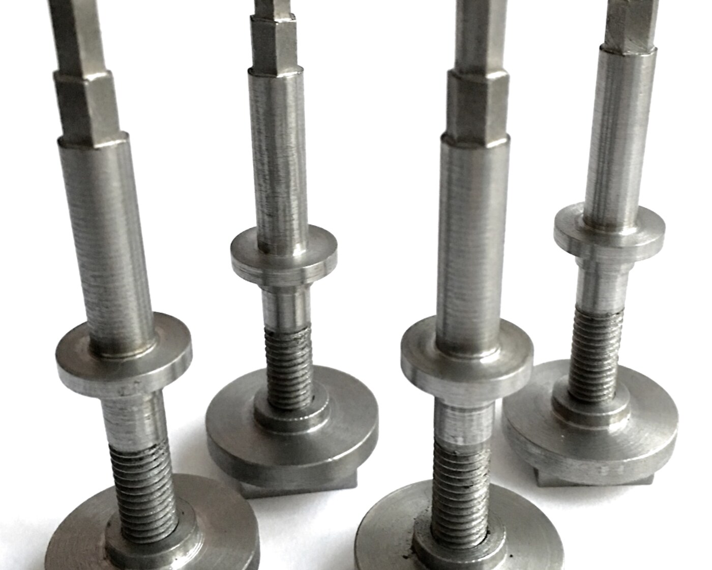 Machined stainless adjustable mounts and leveling feet