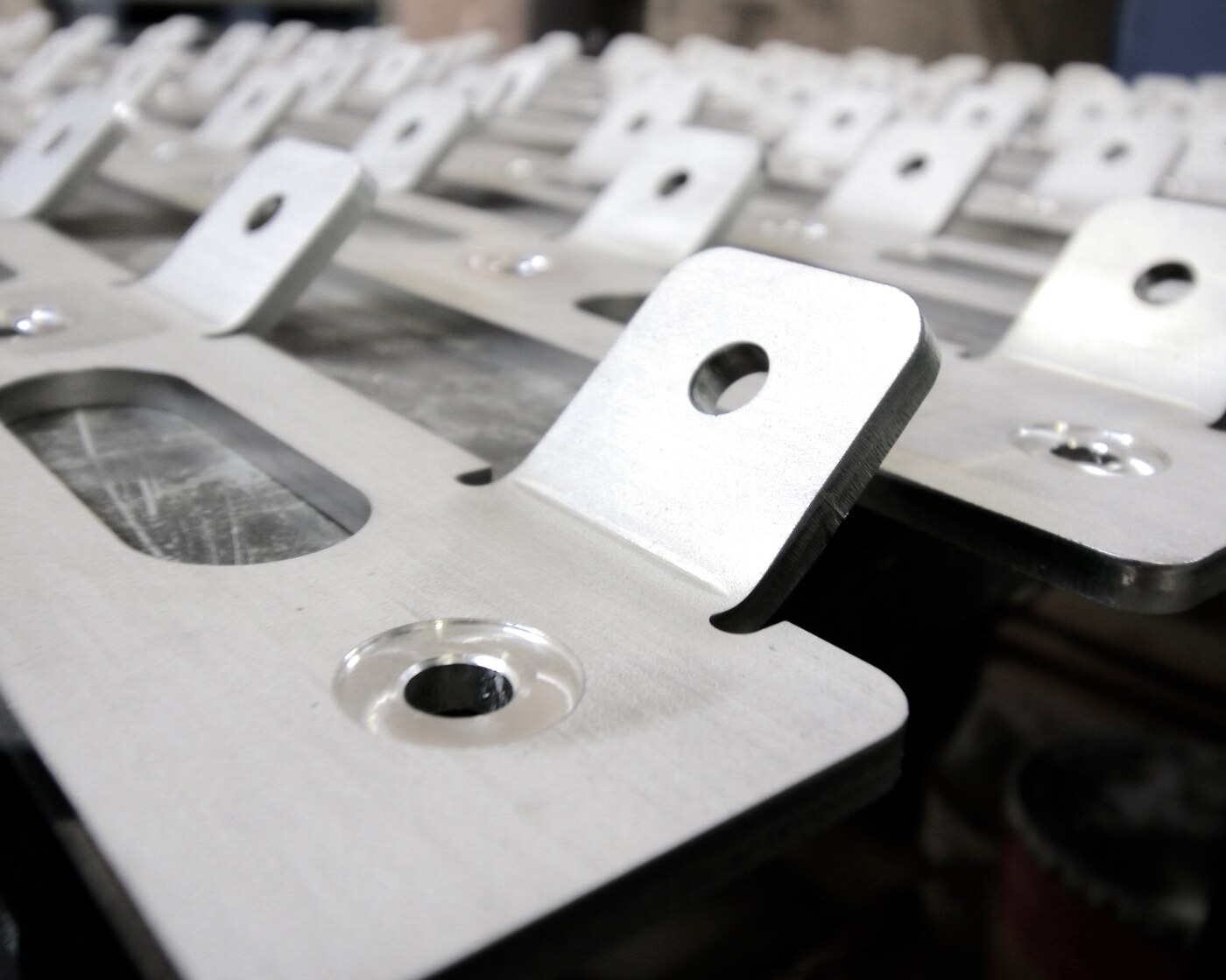 Serial bent secondary-steel brackets