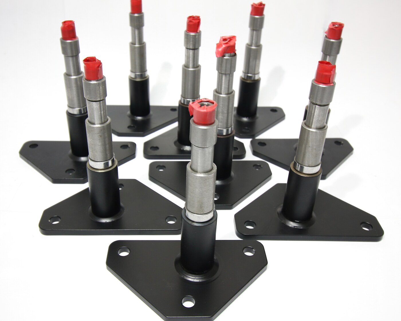 Mounting base plates with studs